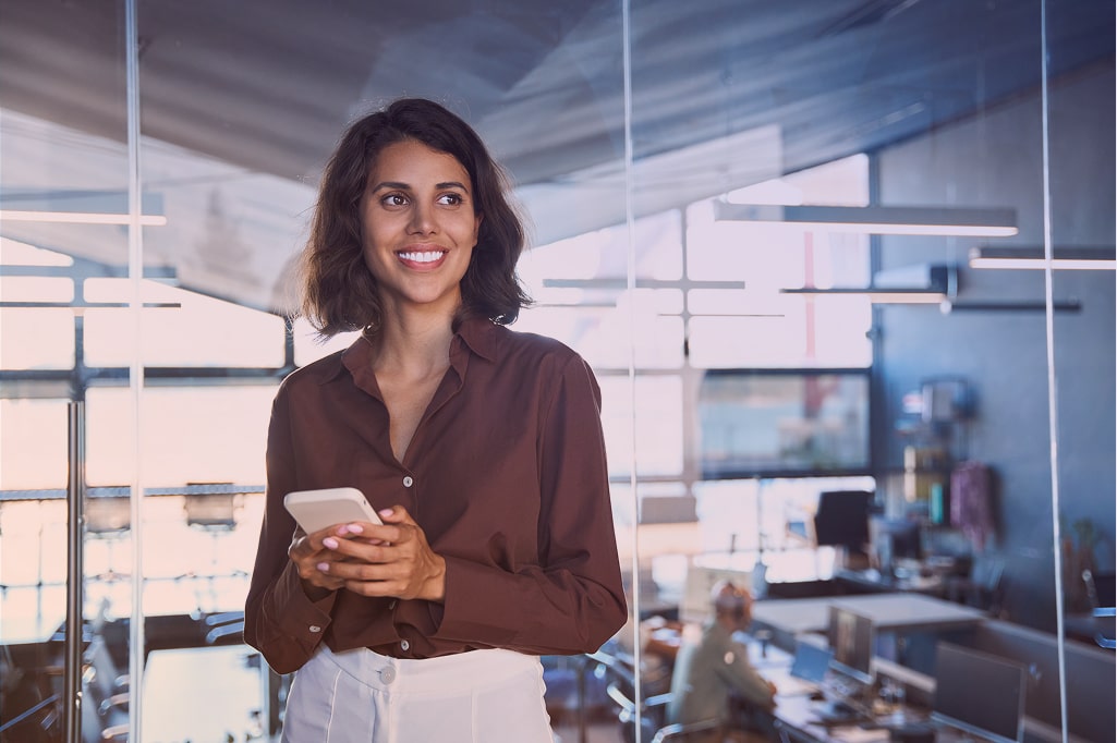 Image of happy employee in the office.